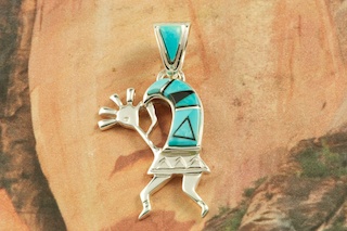 Beautiful Kokopelli Pendant featuring Genuine Turquoise and Black Jade inlaid in Sterling Silver.  Precision inlay on the Bale and Pendant. Free 18